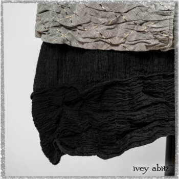 Mewland Jacket in Black Washed Crinkled Linen; Clotaire Sash in Ethereal Cream and Black Fleur Stretch Cotton; Mewland Vest in Beacon Black Embroidered Plaid on Petite Stripe; Mewland Skirt in Black Washed Crinkled Linen. Ivey Abitz bespoke clothing.