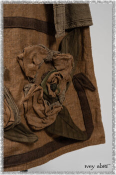 Saint Ans Frock in Chestnut Tree Wondrous Washed Linen with sculptural details in rare weaves; Hudson Duster Coat in Earthen Embroidered Stripe Gauze. Ivey Abitz bespoke clothing.