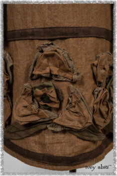 Saint Ans Frock in Chestnut Tree Wondrous Washed Linen with sculptural details in rare weaves; Hudson Duster Coat in Earthen Embroidered Stripe Gauze. Ivey Abitz bespoke clothing.