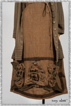 Saint Ans Frock in Chestnut Tree Wondrous Washed Linen with sculptural details in rare weaves; Hudson Duster Coat in Earthen Embroidered Stripe Gauze. Ivey Abitz bespoke clothing.