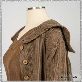 Saint Ans Frock in Chestnut Tree Wondrous Washed Linen with sculptural details in rare weaves; Hudson Duster Coat in Earthen Embroidered Stripe Gauze. Ivey Abitz bespoke clothing.
