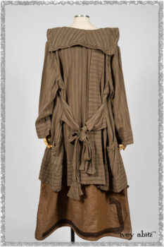 Saint Ans Frock in Chestnut Tree Wondrous Washed Linen with sculptural details in rare weaves; Hudson Duster Coat in Earthen Embroidered Stripe Gauze. Ivey Abitz bespoke clothing.