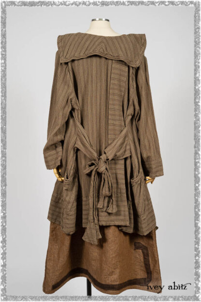 Saint Ans Frock in Chestnut Tree Wondrous Washed Linen with sculptural details in rare weaves; Hudson Duster Coat in Earthen Embroidered Stripe Gauze. Ivey Abitz bespoke clothing.
