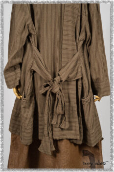 Saint Ans Frock in Chestnut Tree Wondrous Washed Linen with sculptural details in rare weaves; Hudson Duster Coat in Earthen Embroidered Stripe Gauze. Ivey Abitz bespoke clothing.