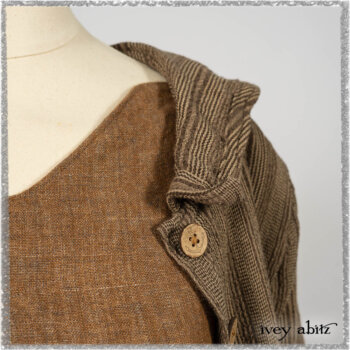 Saint Ans Frock in Chestnut Tree Wondrous Washed Linen with sculptural details in rare weaves; Hudson Duster Coat in Earthen Embroidered Stripe Gauze. Ivey Abitz bespoke clothing.