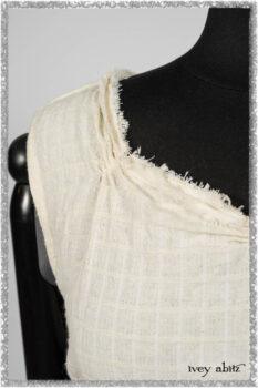 Ardsleydale Frock in Ethereal Cream Embroidered Crushed Plaid; Ardsleydale Sash in Beacon Black Hemstitch Stripe Gauze. Ivey Abitz bespoke clothing.