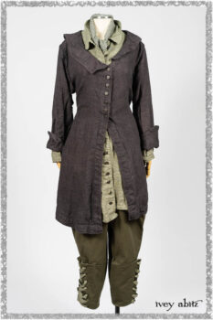 Chevallier Duster Coat in Anchor Grey Wondrous Washed Linen; Chevallier Shirt in Seagrass Petite Check Linen; Chevallier Trousers in Seagrass Herringbone Twill with contrasting lacing to match shirt; Clotaire Sash in Pointillism Silk Chiffon. Ivey Abitz bespoke clothing.