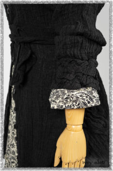 Mewland Jacket in Black Washed Crinkled Linen; Tollie Dress in Ethereal Cream and Black Fleur Stretch Cotton; Mewland Skirt in Black Washed Crinkled Linen. Ivey Abitz bespoke clothing.