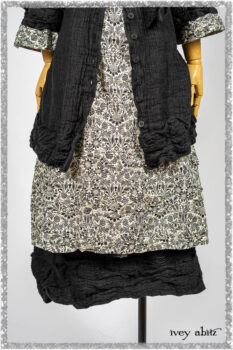 Mewland Jacket in Black Washed Crinkled Linen; Tollie Dress in Ethereal Cream and Black Fleur Stretch Cotton; Mewland Skirt in Black Washed Crinkled Linen. Ivey Abitz bespoke clothing.