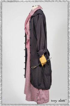 Viv Coat Dress in National Seashore Pinstripe Voile; Clotaire Sash in Red Sky at Night Yarn Dyed Weave; Viv Frock in Red Sky at Night Stripe. Ivey Abitz bespoke clothing.