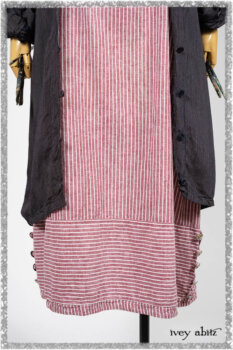 Viv Coat Dress in National Seashore Pinstripe Voile; Clotaire Sash in Red Sky at Night Yarn Dyed Weave; Viv Frock in Red Sky at Night Stripe. Ivey Abitz bespoke clothing.