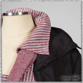 Viv Coat Dress in National Seashore Pinstripe Voile; Clotaire Sash in Red Sky at Night Yarn Dyed Weave; Viv Frock in Red Sky at Night Stripe. Ivey Abitz bespoke clothing.