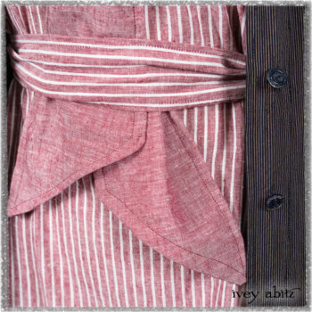 Viv Coat Dress in National Seashore Pinstripe Voile; Clotaire Sash in Red Sky at Night Yarn Dyed Weave; Viv Frock in Red Sky at Night Stripe. Ivey Abitz bespoke clothing.