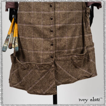 Porte Cochere Frock in Earthen and Plum Stretch Plaid; Fairholme Shirt in Plum Tree Washed Linen; Blanchefleur Sash in Ethereal Floral Cotton Voile. Ivey Abitz bespoke clothing.