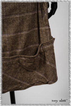 Porte Cochere Frock in Earthen and Plum Stretch Plaid; Fairholme Shirt in Plum Tree Washed Linen; Blanchefleur Sash in Ethereal Floral Cotton Voile. Ivey Abitz bespoke clothing.
