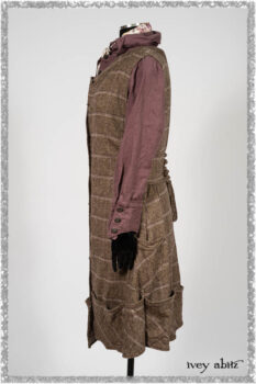 Porte Cochere Frock in Earthen and Plum Stretch Plaid; Fairholme Shirt in Plum Tree Washed Linen; Blanchefleur Sash in Ethereal Floral Cotton Voile. Ivey Abitz bespoke clothing.