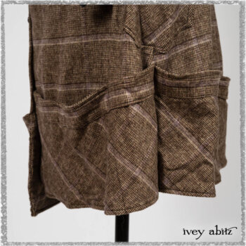 Porte Cochere Frock in Earthen and Plum Stretch Plaid; Fairholme Shirt in Plum Tree Washed Linen; Blanchefleur Sash in Ethereal Floral Cotton Voile. Ivey Abitz bespoke clothing.