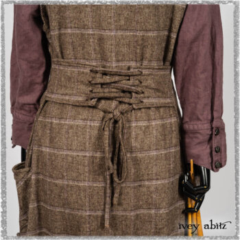 Porte Cochere Frock in Earthen and Plum Stretch Plaid; Fairholme Shirt in Plum Tree Washed Linen; Blanchefleur Sash in Ethereal Floral Cotton Voile. Ivey Abitz bespoke clothing.