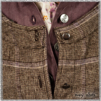Porte Cochere Frock in Earthen and Plum Stretch Plaid; Fairholme Shirt in Plum Tree Washed Linen; Blanchefleur Sash in Ethereal Floral Cotton Voile. Ivey Abitz bespoke clothing.