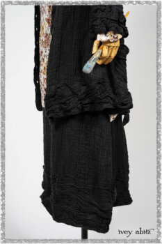 Mewland Jacket in Black Washed Crinkled Linen; Bramley Dress in Plum Tree Watercolour Floral Voile; Mewland Skirt in Black Washed Crinkled Linen; Cilla Slip Frock in Beacon Black Washed Ribbed Knit. Ivey Abitz bespoke clothing.