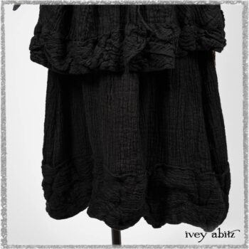 Mewland Jacket in Black Washed Crinkled Linen; Bramley Dress in Plum Tree Watercolour Floral Voile; Mewland Skirt in Black Washed Crinkled Linen; Cilla Slip Frock in Beacon Black Washed Ribbed Knit. Ivey Abitz bespoke clothing.