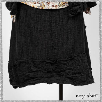 Mewland Jacket in Black Washed Crinkled Linen; Bramley Dress in Plum Tree Watercolour Floral Voile; Mewland Skirt in Black Washed Crinkled Linen; Cilla Slip Frock in Beacon Black Washed Ribbed Knit. Ivey Abitz bespoke clothing.