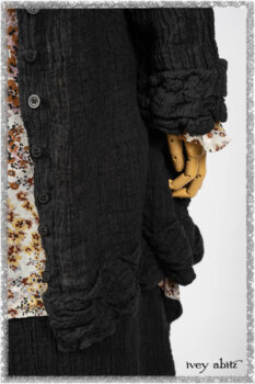 Mewland Jacket in Black Washed Crinkled Linen; Bramley Dress in Plum Tree Watercolour Floral Voile; Mewland Skirt in Black Washed Crinkled Linen; Cilla Slip Frock in Beacon Black Washed Ribbed Knit. Ivey Abitz bespoke clothing.