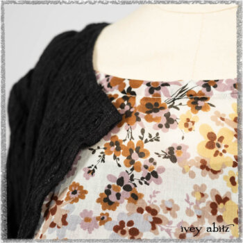 Mewland Jacket in Black Washed Crinkled Linen; Bramley Dress in Plum Tree Watercolour Floral Voile; Mewland Skirt in Black Washed Crinkled Linen; Cilla Slip Frock in Beacon Black Washed Ribbed Knit. Ivey Abitz bespoke clothing.