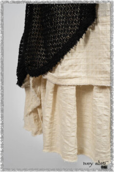 Ardsley Duster Coat in Beacon Black Lace Netted Knit; Ardsleydale Frock in Ethereal Cream Embroidered Crushed Plaid; Clotaire Sash in Ethereal Cream and Black Fleur Stretch Cotton. Ivey Abitz bespoke clothing.