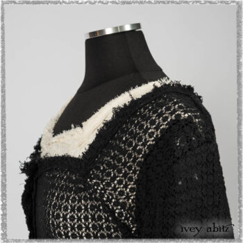 Ardsley Duster Coat in Beacon Black Lace Netted Knit; Ardsleydale Frock in Ethereal Cream Embroidered Crushed Plaid; Clotaire Sash in Ethereal Cream and Black Fleur Stretch Cotton. Ivey Abitz bespoke clothing.