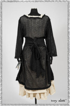 Ardsley Duster Coat in Beacon Black Lace Netted Knit; Ardsleydale Frock in Ethereal Cream Embroidered Crushed Plaid; Clotaire Sash in Ethereal Cream and Black Fleur Stretch Cotton. Ivey Abitz bespoke clothing.
