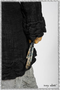 Mewland Jacket in Black Washed Crinkled Linen; Clotaire Sash in Red Sky at Night Yarn Dyed Weave; Mewland Vest in Beacon Black Hemstitch Stripe Gauze. Ivey Abitz bespoke clothing.