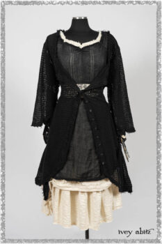 Ardsley Duster Coat in Beacon Black Lace Netted Knit; Clotaire Sash in Ethereal Cream and Black Fleur Stretch Cotton; Ardsley Frock in Beacon Black Hemstitch Stripe Gauze; Ardsleydale Frock in Ethereal Cream Embroidered Crushed Plaid. Ivey Abitz bespoke clothing.
