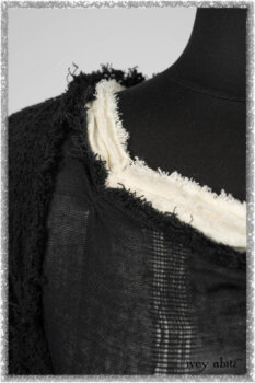 Ardsley Duster Coat in Beacon Black Lace Netted Knit; Clotaire Sash in Ethereal Cream and Black Fleur Stretch Cotton; Ardsley Frock in Beacon Black Hemstitch Stripe Gauze; Ardsleydale Frock in Ethereal Cream Embroidered Crushed Plaid. Ivey Abitz bespoke clothing.
