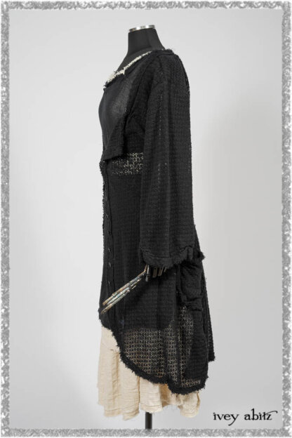 Ardsley Duster Coat in Beacon Black Lace Netted Knit; Clotaire Sash in Ethereal Cream and Black Fleur Stretch Cotton; Ardsley Frock in Beacon Black Hemstitch Stripe Gauze; Ardsleydale Frock in Ethereal Cream Embroidered Crushed Plaid. Ivey Abitz bespoke clothing.