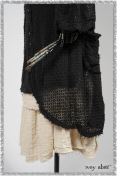 Ardsley Duster Coat in Beacon Black Lace Netted Knit; Clotaire Sash in Ethereal Cream and Black Fleur Stretch Cotton; Ardsley Frock in Beacon Black Hemstitch Stripe Gauze; Ardsleydale Frock in Ethereal Cream Embroidered Crushed Plaid. Ivey Abitz bespoke clothing.