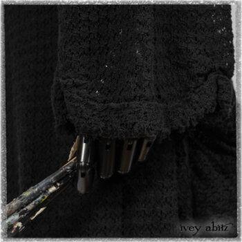 Ardsley Duster Coat in Beacon Black Lace Netted Knit; Clotaire Sash in Ethereal Cream and Black Fleur Stretch Cotton; Ardsley Frock in Beacon Black Hemstitch Stripe Gauze; Ardsleydale Frock in Ethereal Cream Embroidered Crushed Plaid. Ivey Abitz bespoke clothing.