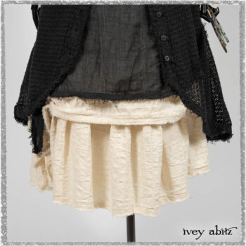 Ardsley Duster Coat in Beacon Black Lace Netted Knit; Clotaire Sash in Ethereal Cream and Black Fleur Stretch Cotton; Ardsley Frock in Beacon Black Hemstitch Stripe Gauze; Ardsleydale Frock in Ethereal Cream Embroidered Crushed Plaid. Ivey Abitz bespoke clothing.