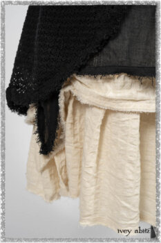 Ardsley Duster Coat in Beacon Black Lace Netted Knit; Clotaire Sash in Ethereal Cream and Black Fleur Stretch Cotton; Ardsley Frock in Beacon Black Hemstitch Stripe Gauze; Ardsleydale Frock in Ethereal Cream Embroidered Crushed Plaid. Ivey Abitz bespoke clothing.