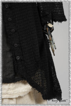 Ardsley Duster Coat in Beacon Black Lace Netted Knit; Clotaire Sash in Ethereal Cream and Black Fleur Stretch Cotton; Ardsley Frock in Beacon Black Hemstitch Stripe Gauze; Ardsleydale Frock in Ethereal Cream Embroidered Crushed Plaid. Ivey Abitz bespoke clothing.