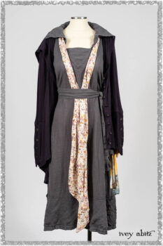 Henrietta Duster Coat in Plum Tree Softest Ribbed Knit; Blanchefler Sash in Ethereal Floral Cotton Voile; Viv Frock in Anchor Grey and Plum Washed Check. Ivey Abitz bespoke clothing.