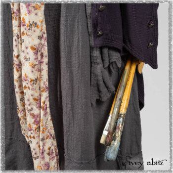 Henrietta Duster Coat in Plum Tree Softest Ribbed Knit; Blanchefler Sash in Ethereal Floral Cotton Voile; Viv Frock in Anchor Grey and Plum Washed Check. Ivey Abitz bespoke clothing.