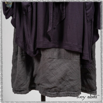 Henrietta Duster Coat in Plum Tree Softest Ribbed Knit; Blanchefler Sash in Ethereal Floral Cotton Voile; Viv Frock in Anchor Grey and Plum Washed Check. Ivey Abitz bespoke clothing.