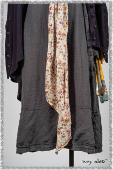 Henrietta Duster Coat in Plum Tree Softest Ribbed Knit; Blanchefler Sash in Ethereal Floral Cotton Voile; Viv Frock in Anchor Grey and Plum Washed Check. Ivey Abitz bespoke clothing.