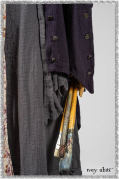 Henrietta Duster Coat in Plum Tree Softest Ribbed Knit; Blanchefler Sash in Ethereal Floral Cotton Voile; Viv Frock in Anchor Grey and Plum Washed Check. Ivey Abitz bespoke clothing.