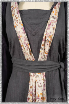 Henrietta Duster Coat in Plum Tree Softest Ribbed Knit; Blanchefler Sash in Ethereal Floral Cotton Voile; Viv Frock in Anchor Grey and Plum Washed Check. Ivey Abitz bespoke clothing.