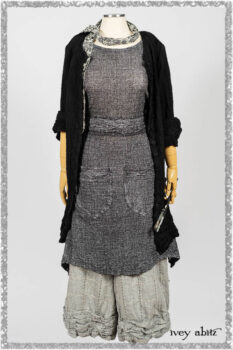Mewland Jacket in Black Washed Crinkled Linen; Clotaire Sash in Ethereal Cream and Black Fleur Stretch Cotton; Bramley Overlay in Black White Painted Puckery Weave; Mewland Trousers in Beacon Blcak Embroidered Plaid on Petite Stripe. Ivey Abitz bespoke clothing.