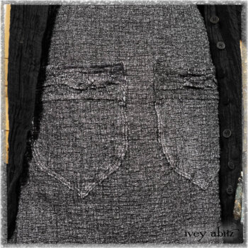 Mewland Jacket in Black Washed Crinkled Linen; Clotaire Sash in Ethereal Cream and Black Fleur Stretch Cotton; Bramley Overlay in Black White Painted Puckery Weave; Mewland Trousers in Beacon Blcak Embroidered Plaid on Petite Stripe. Ivey Abitz bespoke clothing.