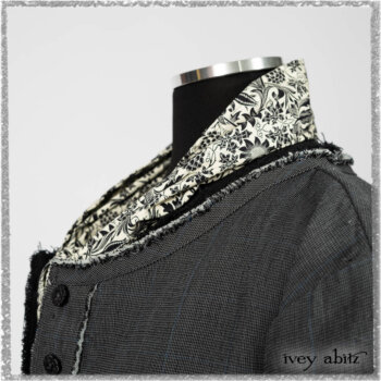 Trelawny Duster Coat in Estuary and Black Houndstooth on Pinstripe; Trelawny Vest in Beacon Black Hemstitch Stripe Gauze; Clotaire Sash in Ethereal Cream and Black Fleur Stretch Cotton; Ardsleydale Frock in Ethereal Cream Embroidered Crushed Plaid. Ivey Abitz bespoke clothing.
