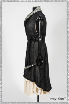Trelawny Vest in Beacon Black Hemstitch Stripe Gauze; Clotaire Sash in Ethereal Cream and Black Fleur Stretch Cotton; Ardsleydale Frock in Ethereal Cream Embroidered Crushed Plaid. Ivey Abitz bespoke clothing.